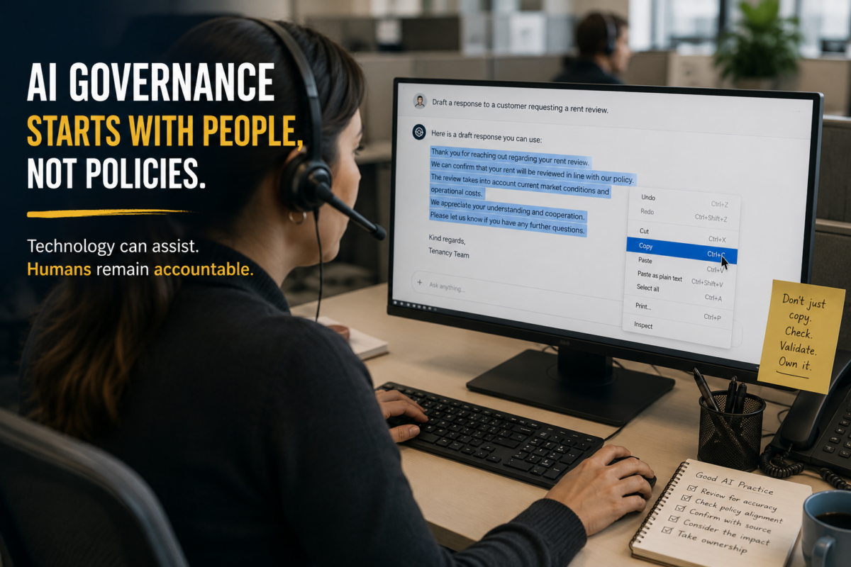 Alt Text Call centre employee reviewing AI-generated content before copying it into a customer-facing workflow, demonstrating Human-in-the-Loop AI governance and accountability.